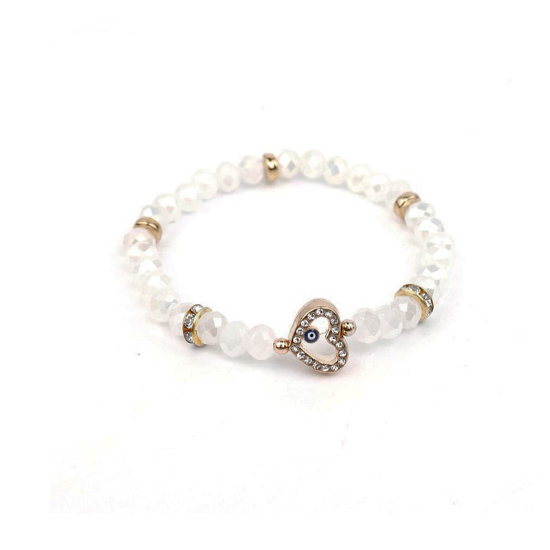 Pulsera Elastica Transparente con Corazon Dorado con Strass