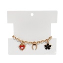 Pulsera Trendy Dorada con Corazon Rojo y Dijes Varios